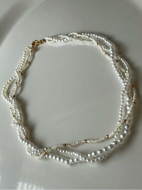 Elegant Multi-Strand White Pearl Twist Necklace with Gold Accents